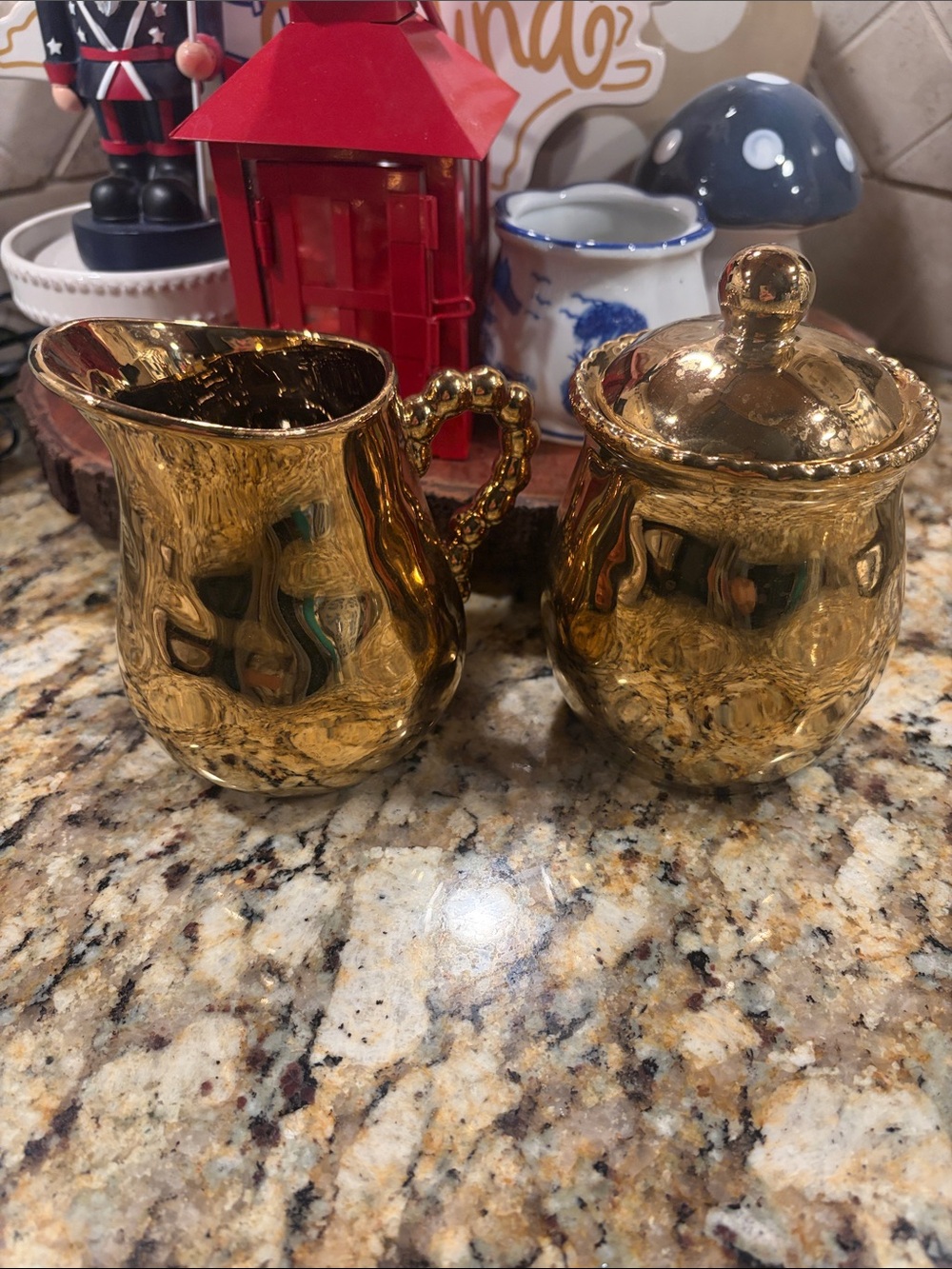 Gold Ceramic Creamer and Sugar Set with Beaded Details.